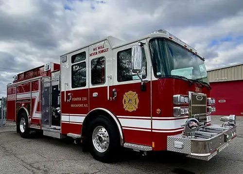 Pumper front-right exterior view showing crew cab and side body compartments