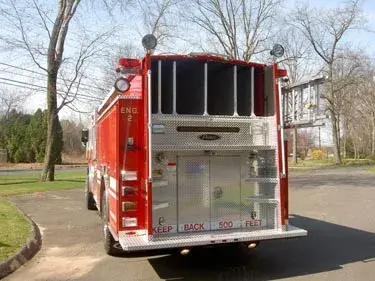 Rear view showing rear panel, warning lights, and hosebed area