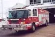Rescue truck front-left exterior view showing enclosed cab and long body