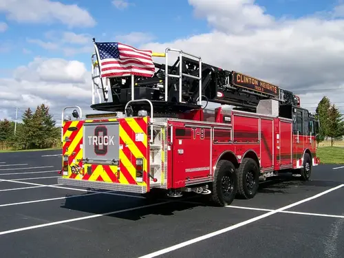 Rear-left exterior view showing side body and rear chevrons