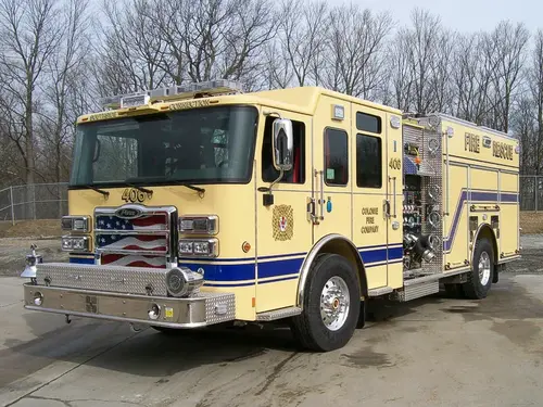 Front-right exterior view showing bumper, cab, and side body