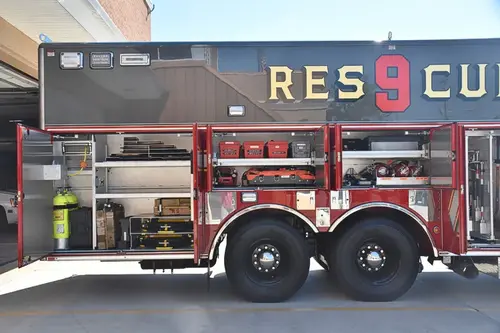 Rear-side profile view showing rescue body and tandem wheel section