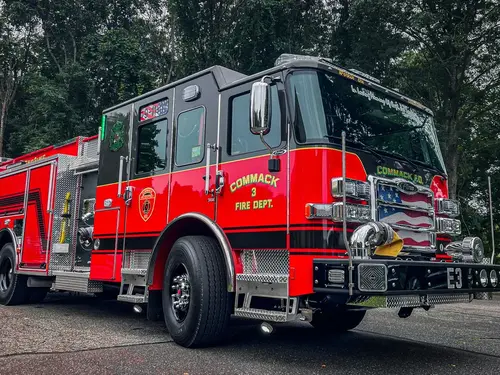 Pumper rear-left exterior view showing side body and rear chevrons