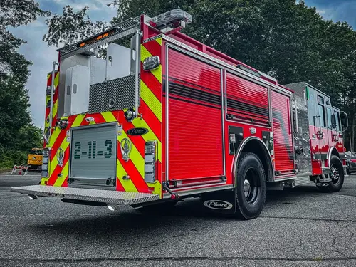 Rear-right exterior view showing side body and open rear-facing area
