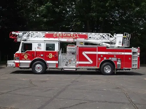 Driver-side full profile showing ladder sections and side compartments