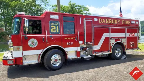 Rescue pumper side profile view showing full body and wheelbase