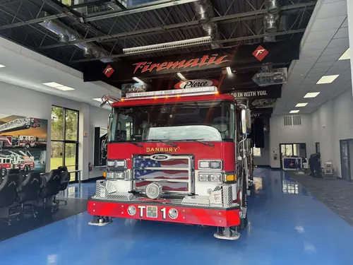 Danbury Pierce Enforcer 100-foot aerial tower front view inside the apparatus bay