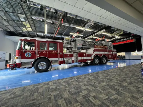Danbury Pierce Enforcer 100-foot aerial tower side profile inside the apparatus bay