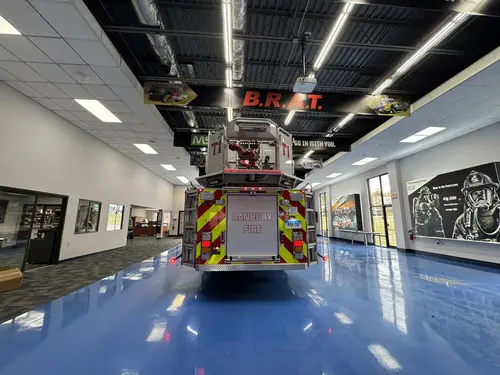 Danbury Pierce Enforcer 100-foot aerial tower rear view inside the apparatus bay