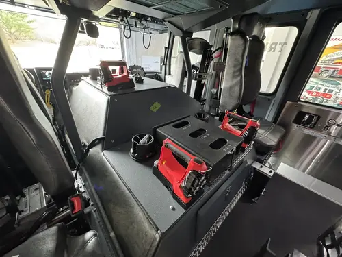 Danbury Pierce Enforcer 100-foot aerial tower cab interior with seating and controls