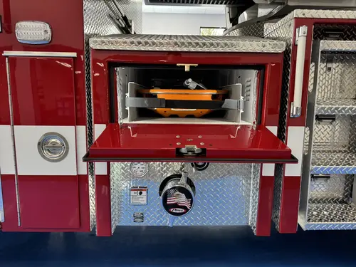 Danbury Pierce Enforcer 100-foot aerial tower front bumper tray opened