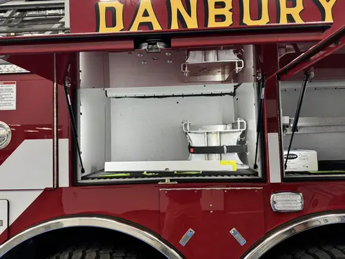 Danbury Pierce Enforcer 100-foot aerial tower side compartment under the aerial