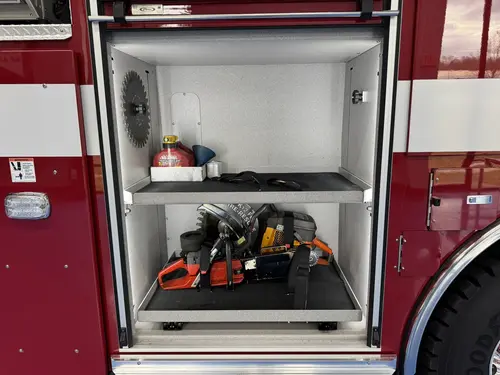 Danbury Pierce Enforcer 100-foot aerial tower open side compartment with mounted tools