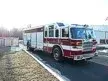 Wide front right view of the parked heavy rescue truck with full apparatus length visible.