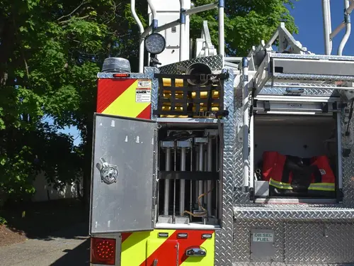Rear body compartment close-up showing stacked mounts and rear hardware