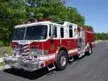 Front-left exterior profile showing pumper cab and side body