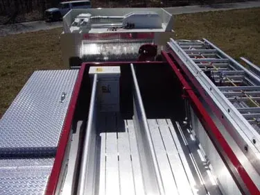 Top deck view showing hosebed channels and side ladders