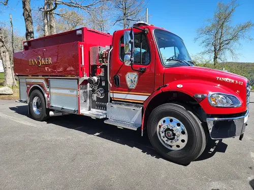 Tanker side profile view showing full tank body and wheelbase