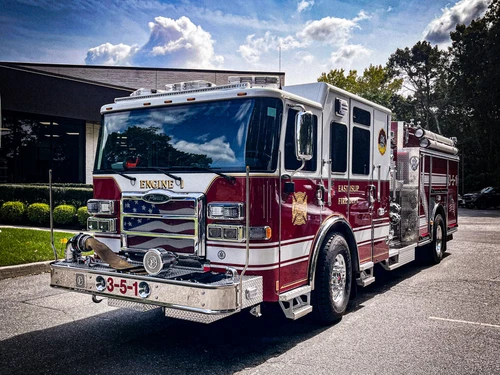 Pumper front-left exterior view showing grille, bumper, and side body