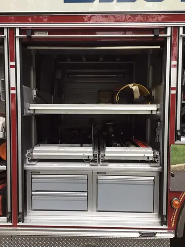 Open center compartment with split slide trays and lower drawers