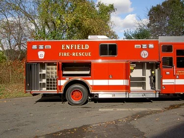 Mid-body compartment view showing open shelving and side storage layout