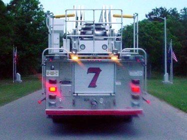 Rear view showing rear platform structure and warning lights