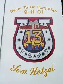 Commemorative decal close-up showing 9-11 memorial text and badge graphic