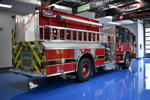 Rear-right exterior view showing side compartments and rear body section