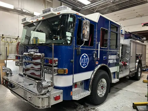 Goshen Pierce Enforcer pumper front-left exterior view inside the apparatus bay