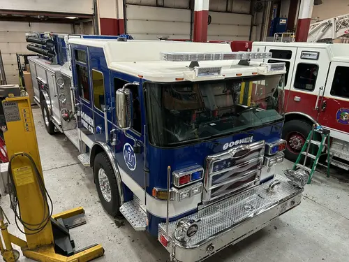 Goshen Pierce Enforcer pumper front-right exterior view inside the apparatus bay