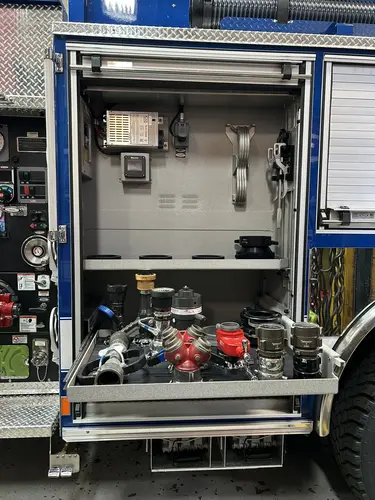 Goshen Pierce Enforcer pumper open side compartment with storage shelves