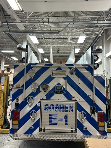 Goshen Pierce Enforcer pumper lower body compartment with hose and tools