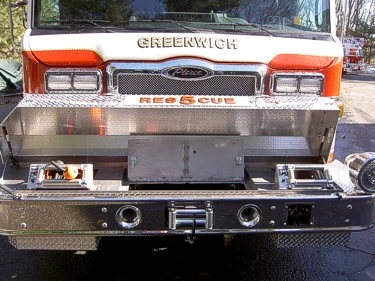 Front bumper close-up showing winch mounts, inlets, and RESCUE lettering