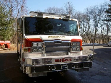 Head-on front view showing grille, bumper, and RESCUE lettering
