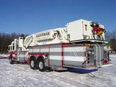 Rear-right exterior view showing bucket platform and side compartment doors
