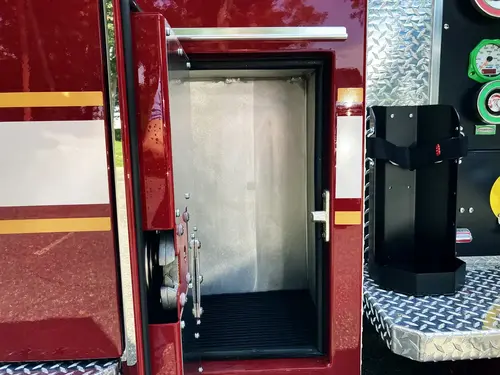Rear crew area view showing SCBA seat backs and aisle space