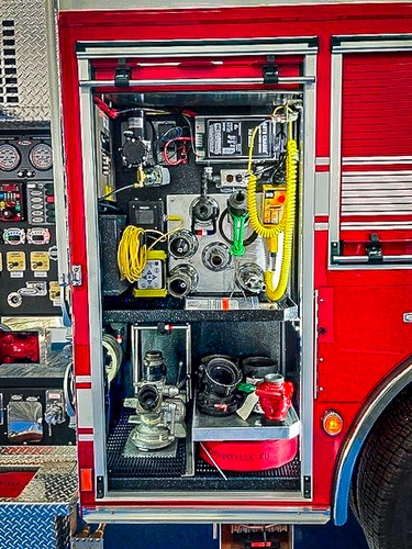 Open pump-side compartment showing control hardware and hose connections