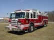 Front-left exterior profile duplicate angle showing heavy rescue body