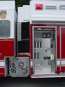 Open pump and control compartment view showing valves and gauge panels