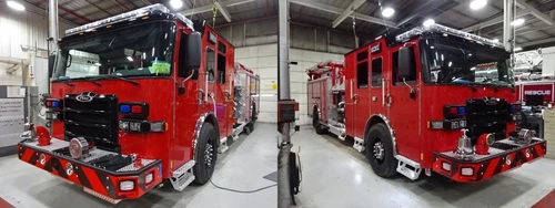 Apparatus lineup view indoors showing three red trucks parked side by side