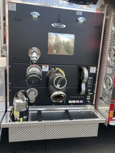 Hosebed view showing stacked hose bundles above rear chevrons