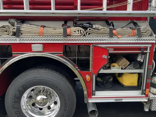 Pull-out tray view showing rescue equipment and storage case layout
