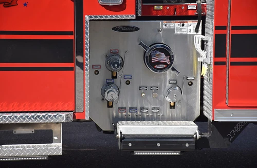 Pump panel close-up showing intake controls and gauge cluster