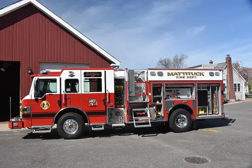 Driver-side profile showing pumper body and side compartment line