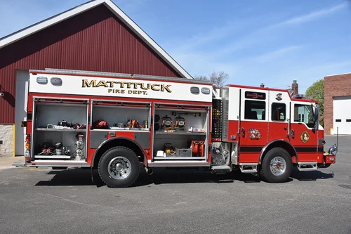 Driver-side profile with compartment doors open showing tool storage