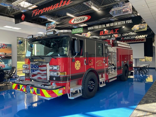 Pumper front-left exterior view showing grille, bumper, and side body