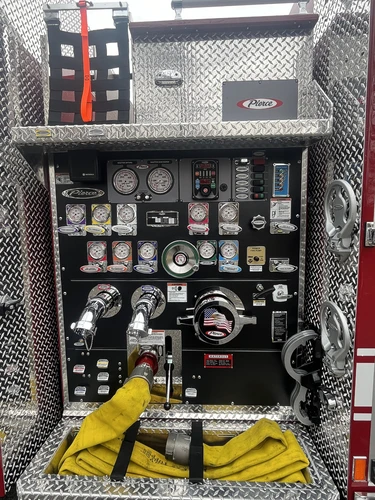 Pump panel close-up showing gauges, intake ports, and control labels