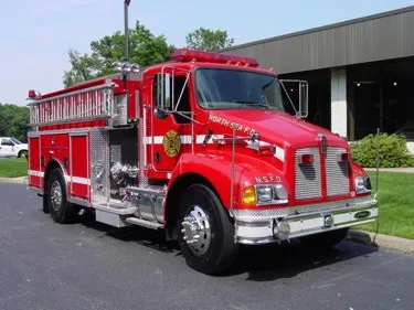Tanker-pumper front-left exterior view showing Kenworth-style cab and long body