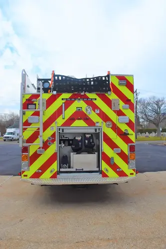 Rear view showing chevrons, rear opening, and tailboard area