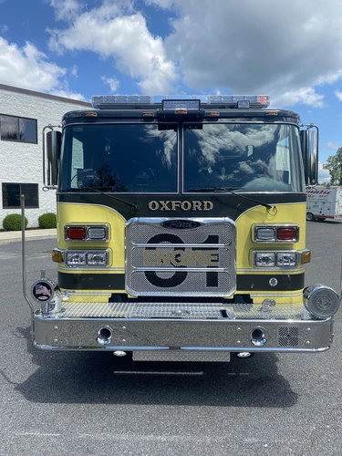 Head-on front view showing grille and cab from low angle